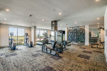 Aura avant apartments in lewisville, texas fitness center